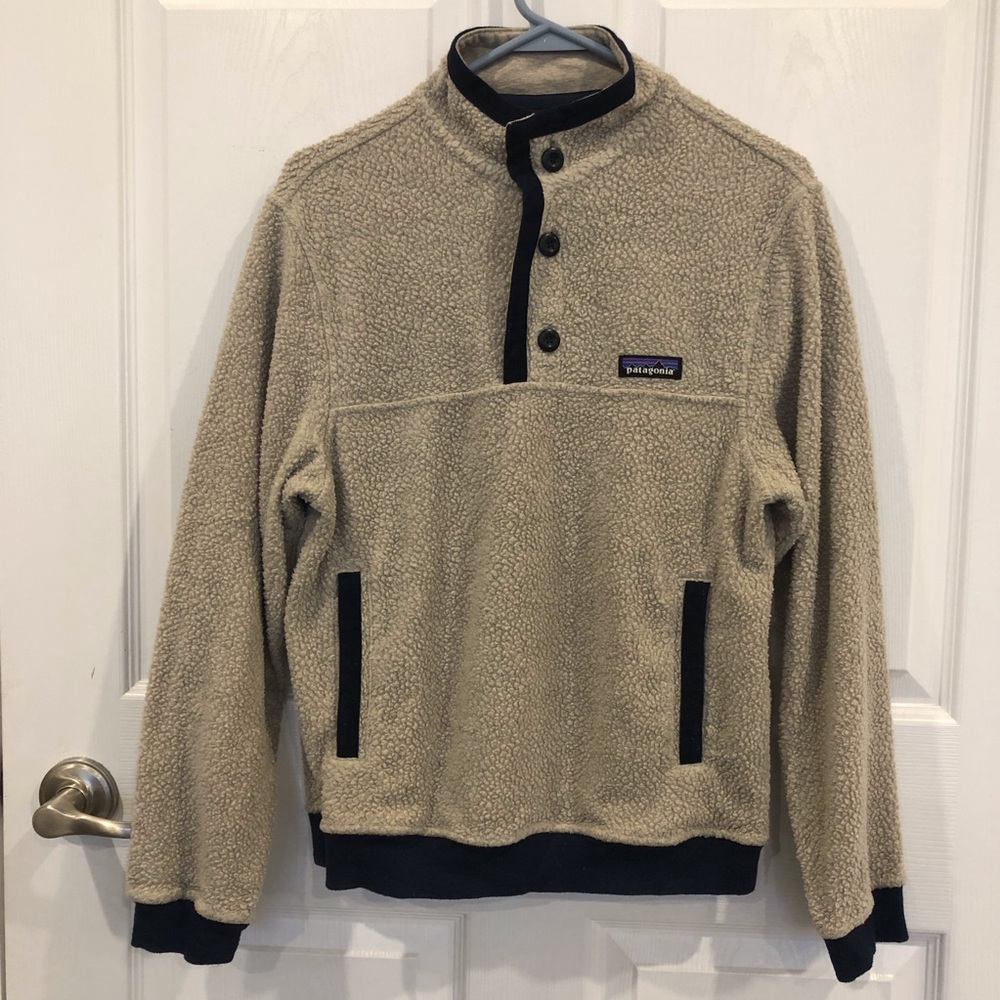 Patagonia Shearling Button Pullover rib knit cuffs and hem hand warmer pockets.